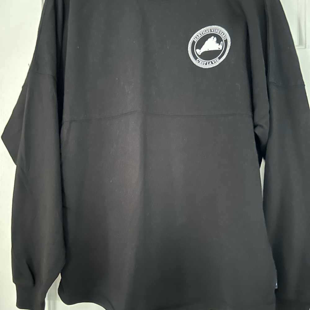 Warm long sleeve shirt black size S but could fit a medium. Can be men or women.